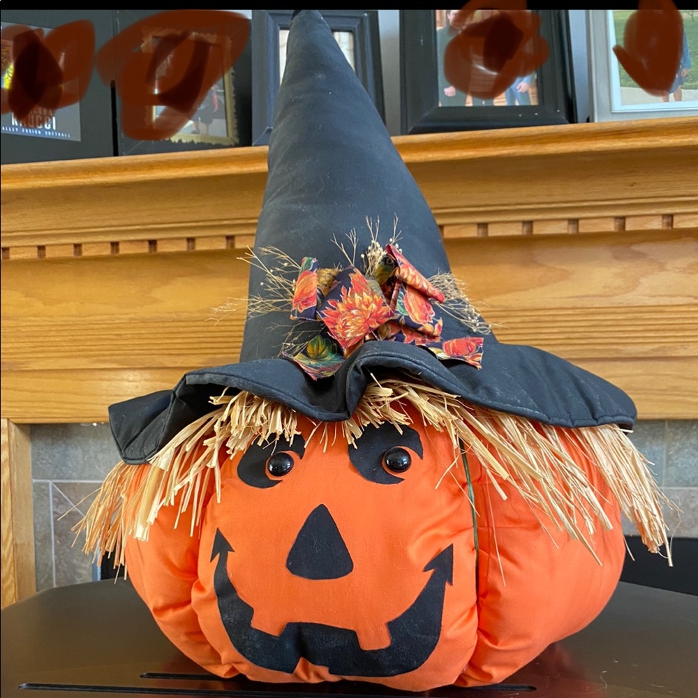 Stuffed Halloween pumpkin with black witches hat and ribbon